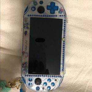 Ps vita slim, icy blue color + games + case!